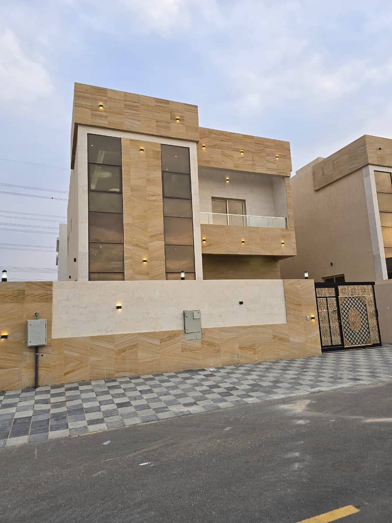 Villa for rent in Ajman, Al Yasmeen area 6 master rooms, a hall, a living room, a kitchen, a maid’s room, and a monster room The price is 110 thousand
