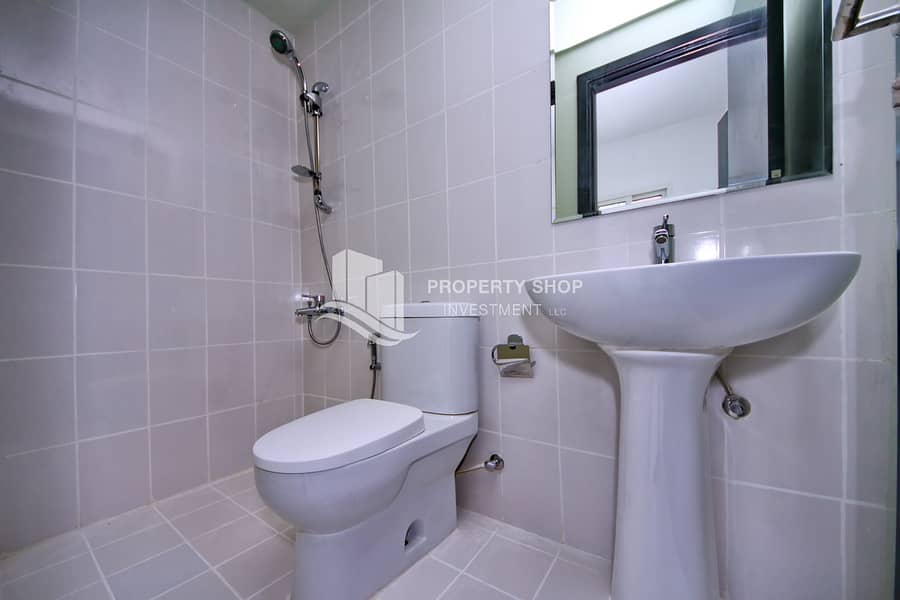 10 3 bedroom-apartment-abu-dhabi-al-reef-downtown-maids-bathroom. JPG