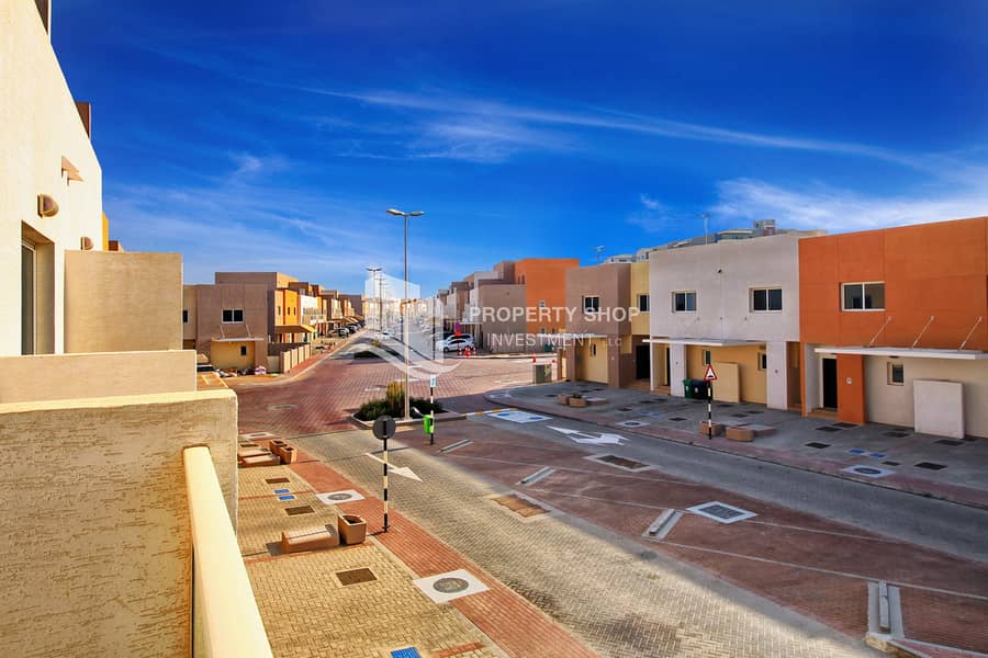 12 3-bedroom-abu-dhabi-al-reef-contemporary-village-view-fr-balcony. JPG