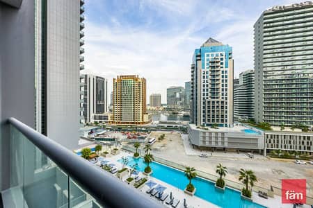 Studio for Sale in Business Bay, Dubai - Brand New | Fitted Kitchen | Pool & Canal View
