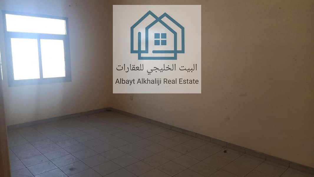 Apartment for annual rent in Ajman, two rooms and a hall, Al-Rumaila