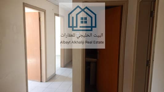 1 Bedroom Flat for Rent in Al Rawda, Ajman - An apartment for annual rent in Ajman, one room and a hall in the Rawda area