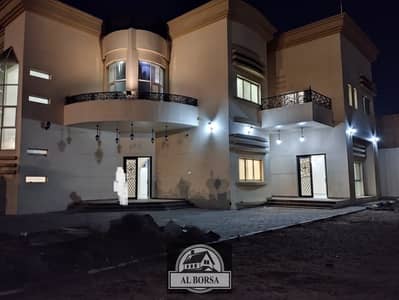A beautiful villa for rent in Ajman Al Hamidiya, featuring a charming view of Asphalt Street, cash in one go