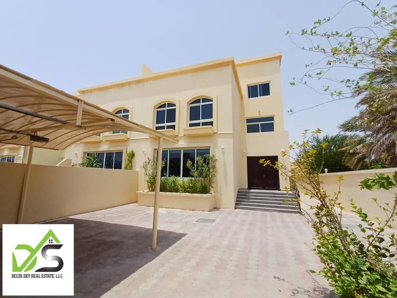 High Standard  4 Bedrooms Villa private entrance with large garden and private swimming pool in Khalifa City .