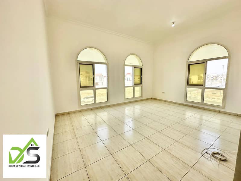 A beautiful two-bedroom apartment with a large hall in Khalifa City A, near the hospital and buses, with an annual rent of 57,000 dirhams