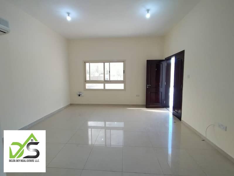 wonderful opportunity to occupy an amazing two-bedroom, two-hall, two-bathroom apartment in Shakhbout, near the market, with an annual rent of 54,000 dirhams.
