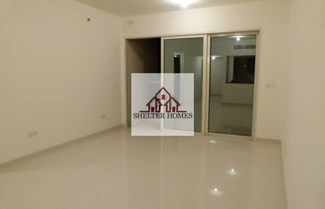 2 Bedroom Flat for Rent in Al Reem Island, Abu Dhabi - Living room facing balcony. jpg