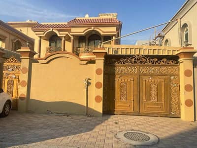 For rent, a two-storey villa in Al Rawda 3 area, consisting of 5 rooms, a sitting room, a hall, and a maids room