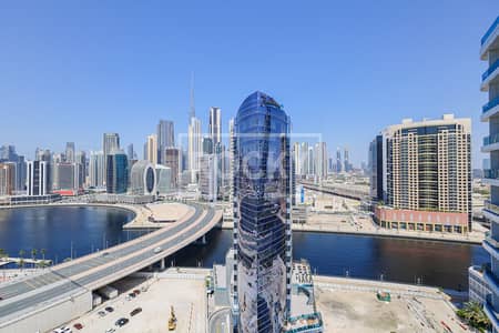 1 Bedroom Apartment for Sale in Business Bay, Dubai - Closed Kitchen | VOT | Canal View