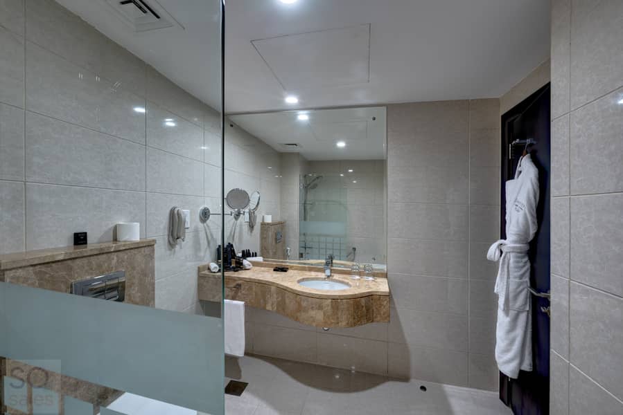 5 Ghaya Grand Hotel Dubai  - One Bedroom Bathroom 4. jpg