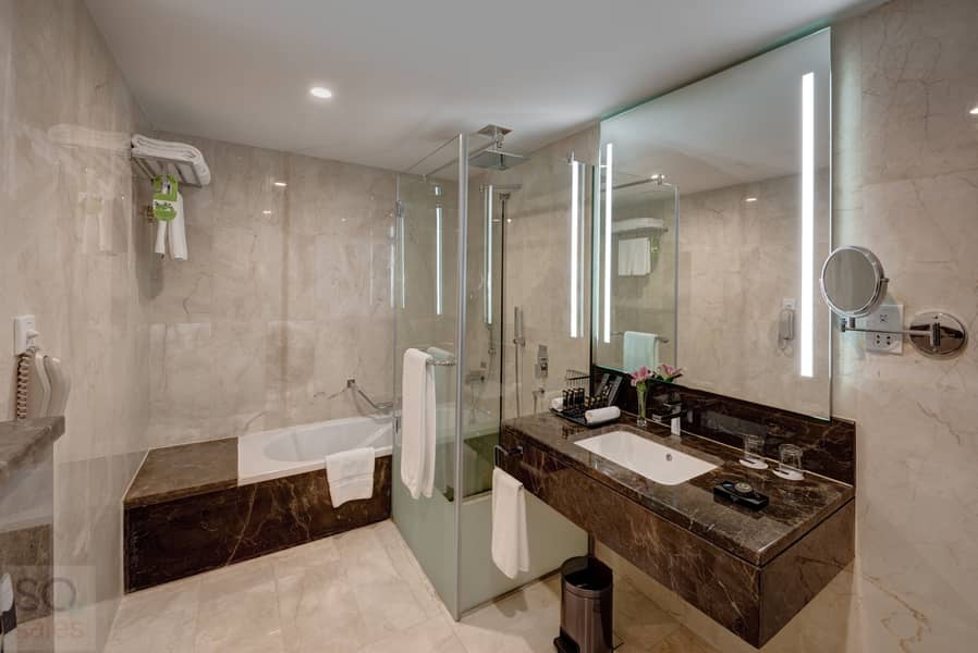 7 Ghaya Grand Hotel Dubai  - One Bedroom Bathroom 6. jpg