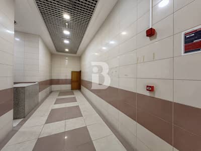 Showroom for Rent in Al Qasimia, Sharjah - Road Facing | Prime Location | Workshop Space