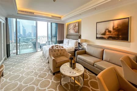 شقة فندقية  للايجار في وسط مدينة دبي، دبي - شقة فندقية في كمبينسكي ذا بوليفارد،وسط مدينة دبي 133000 درهم - 8863423