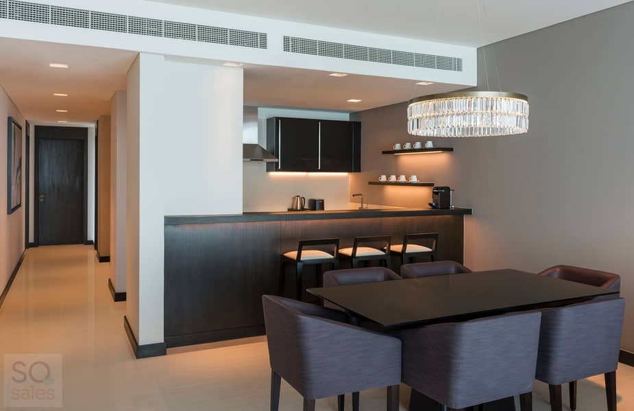 2 Sheraton Grand Hotel, Dubai - 3 Bedroom Apartment Kitchen & Dining Area - Copy. jpg