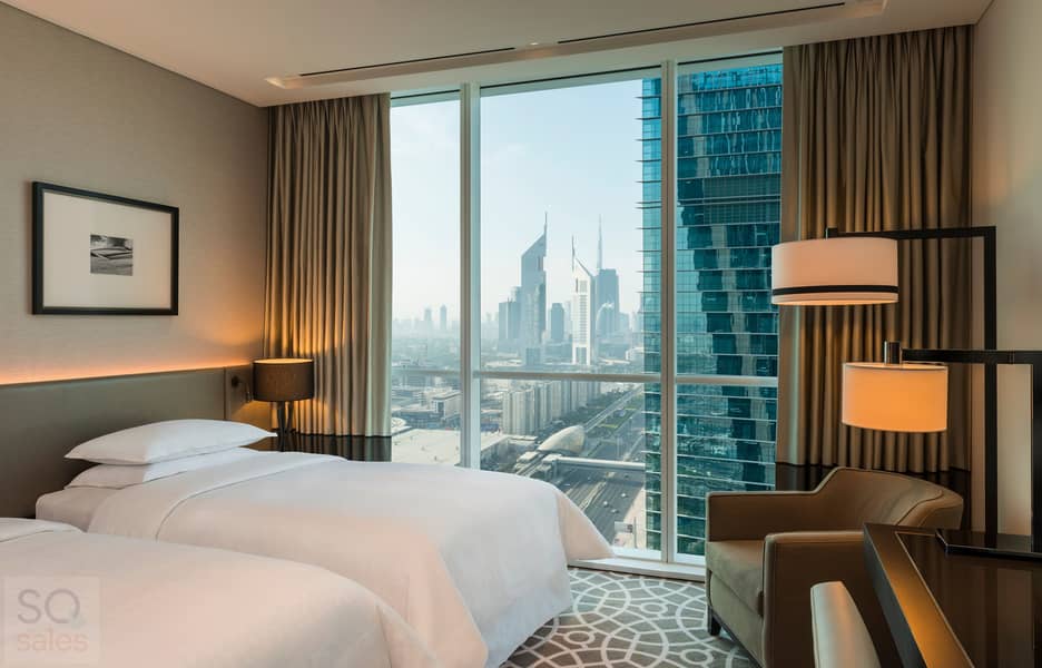 4 Sheraton Grand Hotel, Dubai - Two & Three Bedroom Apartment Twin Room - Copy. jpg