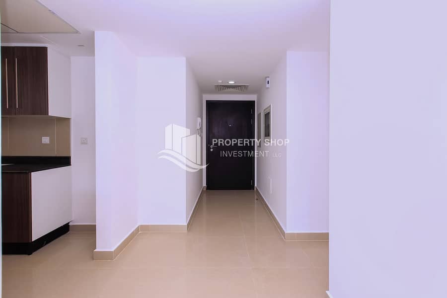 9 2-bedroom-apartment-abu-dhabi-al-reef-downtown-foyer. JPG