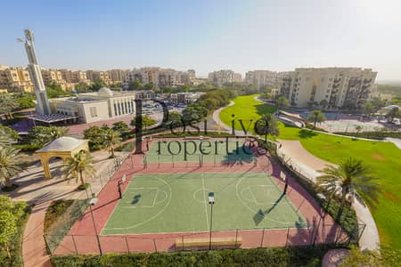 1 Bedroom Flat for Sale in Remraam, Dubai - Closed kitchen | exclusive 1BR | Next to pool675