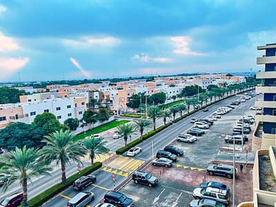 2 Bedroom Apartment for Sale in Al Reef, Abu Dhabi - Street View4. jpg