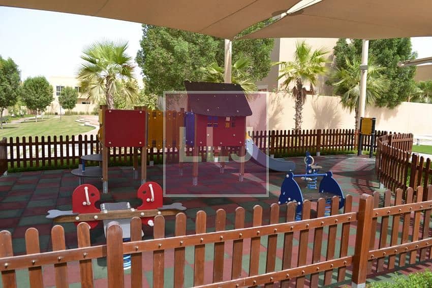 12 Actual-GWwLaIsGfpjtLjpWaerut011childrens_play_areas_with_soft_flooring_and_shading_are_located_throughout_al_raha_gardens. jpg
