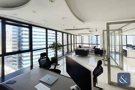 Office for Sale in Jumeirah Lake Towers (JLT), Dubai - MID FLOOR | HIGH-QUALITY | PARTITIONED
