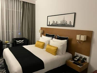 شقة فندقية  للبيع في برشا هايتس (تيكوم)، دبي - شقة فندقية في فندق سكاي سنتر،برشا هايتس (تيكوم) 680000 درهم - 8875006