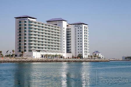 شقة 1 غرفة نوم للايجار في نخلة جميرا، دبي - شقة في أزور ريزيدنسز،نخلة جميرا 1 غرفة 190000 درهم - 8875230