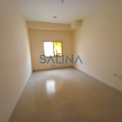 Spacious studio apartment for yearly rent in Al Rawda1 area, close to Sheikh Ammar Street,ground floor,central air conditioning, semi-detached kitchen