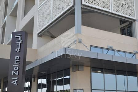 1 Bedroom Flat for Sale in Al Raha Beach, Abu Dhabi - Actual-2rzAcbOqpUgbHxxMO2v9g002al_zeina_sign_greets_you_at_the_entrance_to_the_project_in_front_of_precinct_d. jpg