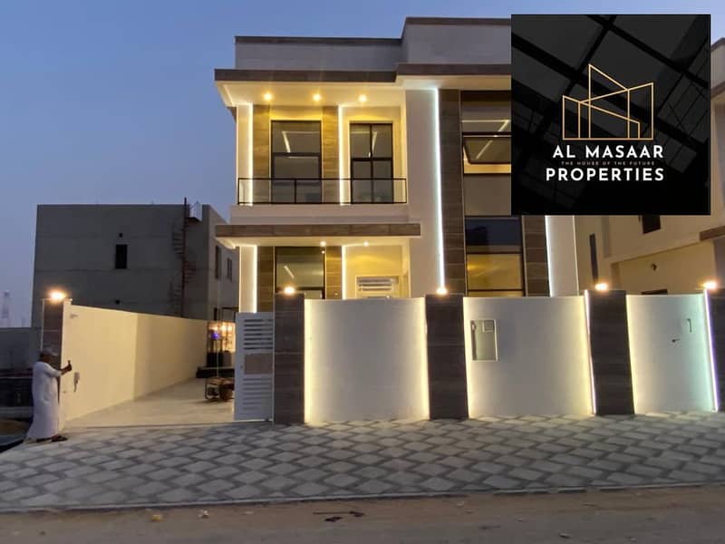 Villa in the most prestigious areas of Ajman, with a distinctive modern design, a stone facade, with a large area, without down payment, and at a spec