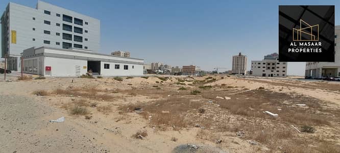 Plot for Sale in Al Jurf, Ajman - For sale, residential and commercial land in Al Jurf Industrial City 3 Building permit, Ground 6, in a very prime location, close to the main street
