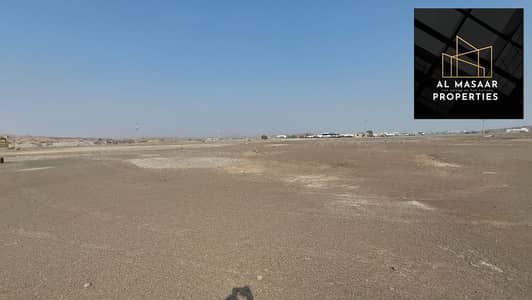 Plot for Sale in Al Manama, Ajman - Owns residential land in Manama, area of ​​900 square meters, 4 breezes required, 240 dirhams, corner close to the main street.