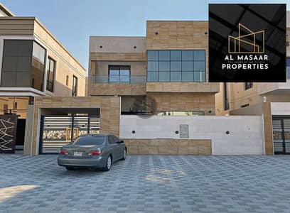 5 Bedroom Villa for Sale in Al Yasmeen, Ajman - For sale, a stone-faced villa in the Jasmine area, without down payment and without annual fees, on a main street, 100% full bank financing, and free