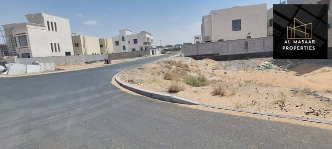 Plot for Sale in Al Yasmeen, Ajman - Land for sale in Ajman, Al Yasmine, behind a garden directly, an area of 3014 feet, at a snapshot price, and a very excellent location