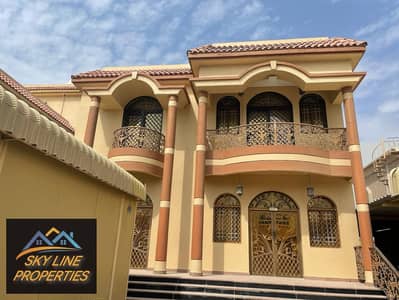 A 5-bedroom villa with a pool is available for rent in Al Mowaihat 3, Ajman