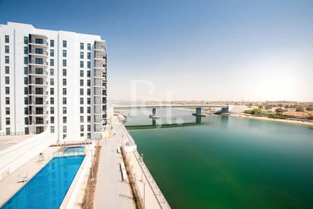 2 Bedroom Apartment for Sale in Yas Island, Abu Dhabi - water-edge-yas-island-abu-dhabi-balcony-pool-view (8). JPG