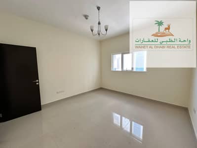 For annual rent in Sharjah, two rooms, a hall, and a laundry room