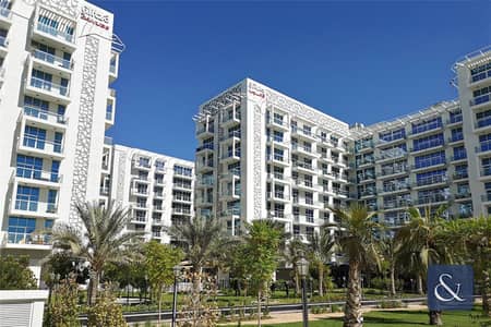 1 Bedroom Flat for Rent in Dubai Studio City, Dubai - Garden View | Unfurnished | Rooftop Pool
