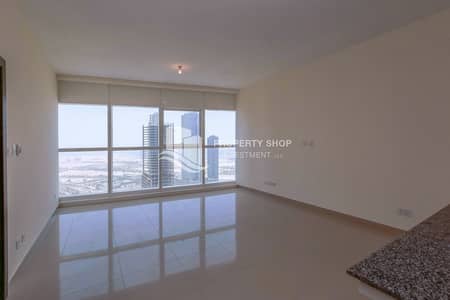 شقة 1 غرفة نوم للايجار في جزيرة الريم، أبوظبي - 1-bedroom-abu-dhabi-al-reem-island-city-of-lights-sigma-tower-1-living-area (1). JPG