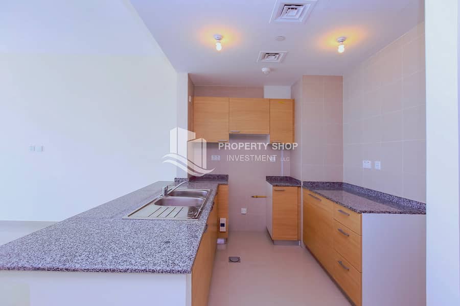 10 1-bedroom-abu-dhabi-al-reem-island-city-of-lights-sigma-tower-1-kitchen (1). JPG