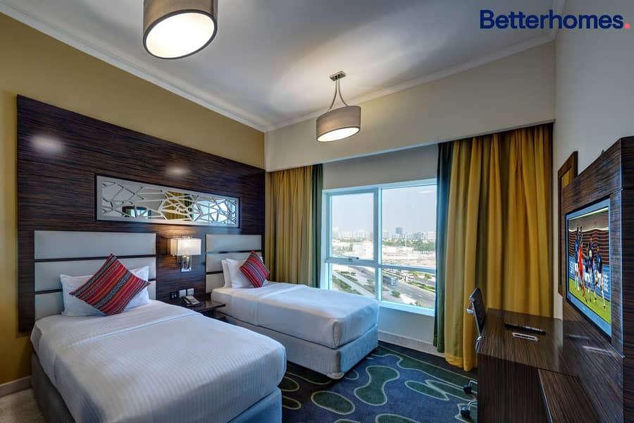 شقة فندقية في فندق فينتاج جراند،مدينة دبي للإنتاج 2 غرف 144000 درهم - 8895323