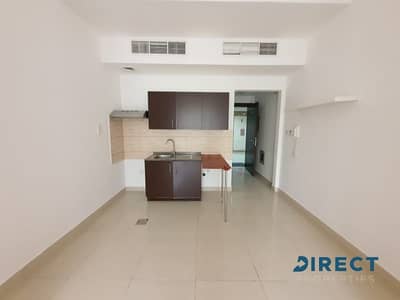 Studio for Rent in Jumeirah Village Circle (JVC), Dubai - Community View | Low floor | Unfurnished  |Balcony
