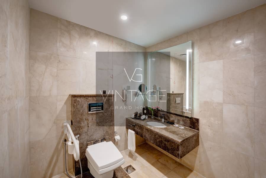 8 Ghaya Grand Hotel Dubai  - One Bedroom Bathroom 7. jpg