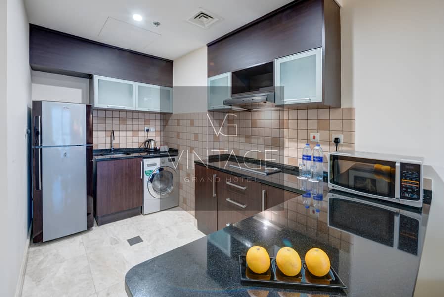 4 Ghaya Grand Hotel Dubai  - One Bedroom Kitchen. jpg