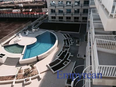 Studio for Rent in Jumeirah Village Circle (JVC), Dubai - POOL VIEW|LARGE FURNISHED STUDIO| WITH BALCONY KENSINGTON MANOR