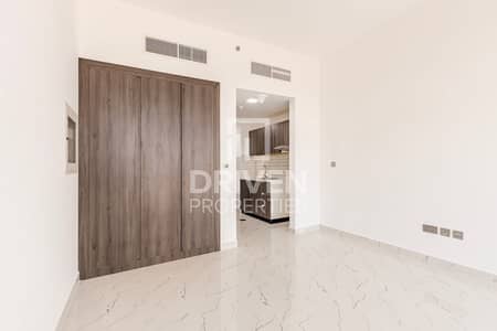 Studio for Rent in Dubai Residence Complex, Dubai - Brand New and Bright Studio | Ready to Move In