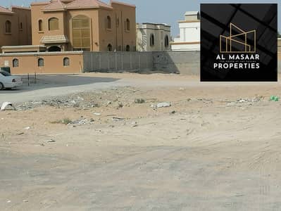 Plot for Sale in Al Manama, Ajman - For sale land in Manama, Ajman, District 11, in the middle of Al-Amar, freehold for all nationalities, at a price of a snapshot