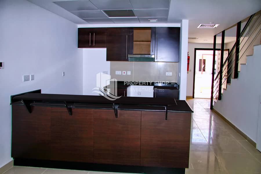 7 2-bedroom-villa-abu-dhab-al-reef-arabian-village-kitchen. JPG