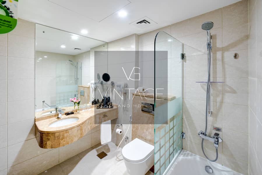 10 Ghaya Grand Hotel Dubai  - One Bedroom Bathroom 5-2. jpg