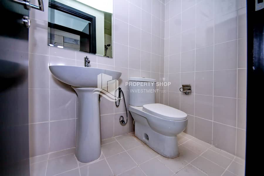 16 3-bedroom-apartment-abu-dhabi-al-reef-downtown-maids-bathroom. JPG