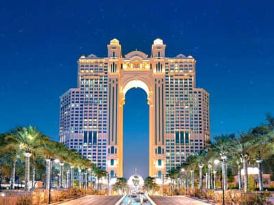 1 Bedroom Apartment for Sale in The Marina, Abu Dhabi - Hotel-Facade-Night-1-1-1-1140x815. jpg